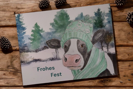 Weihnachts-Postkarte mit Kuh